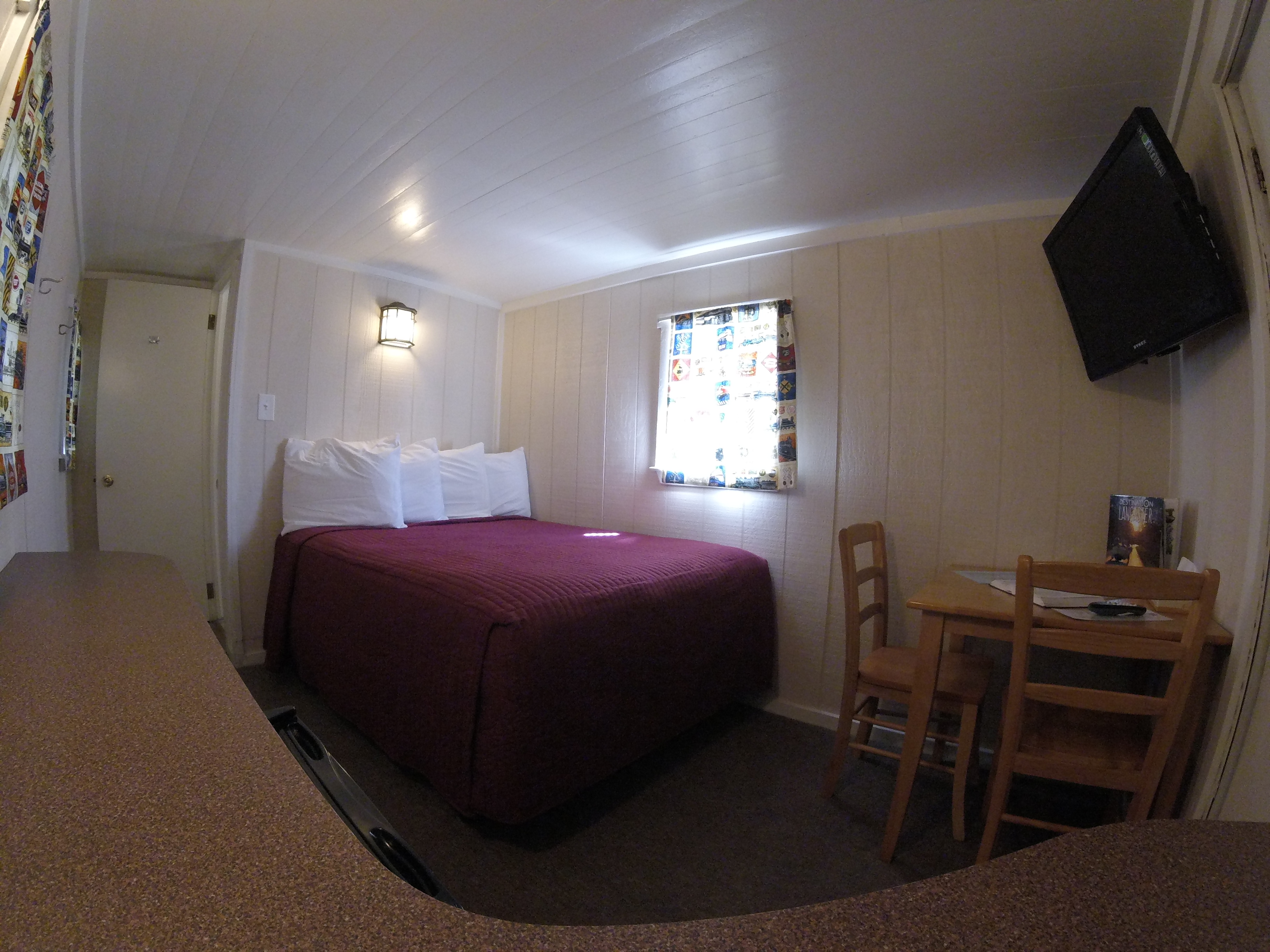 interior view of couples half caboose motel room
